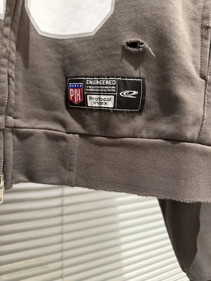 Vestes de football unisexe de haute qualité avec broderie effet déchiré et slogan numérique