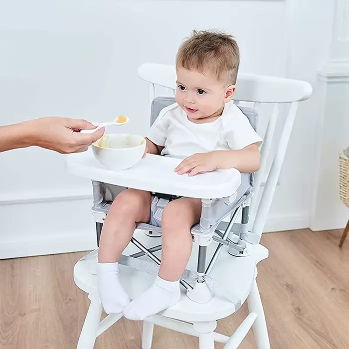Chaise d'appoint portable ergonomique pour bébé confortable pour repas de famille et sorties en extérieur