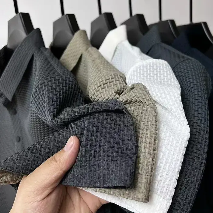 Nouveaux hommes d'affaires décontracté à manches courtes fleur d'os couleur unie POLO mode respirant