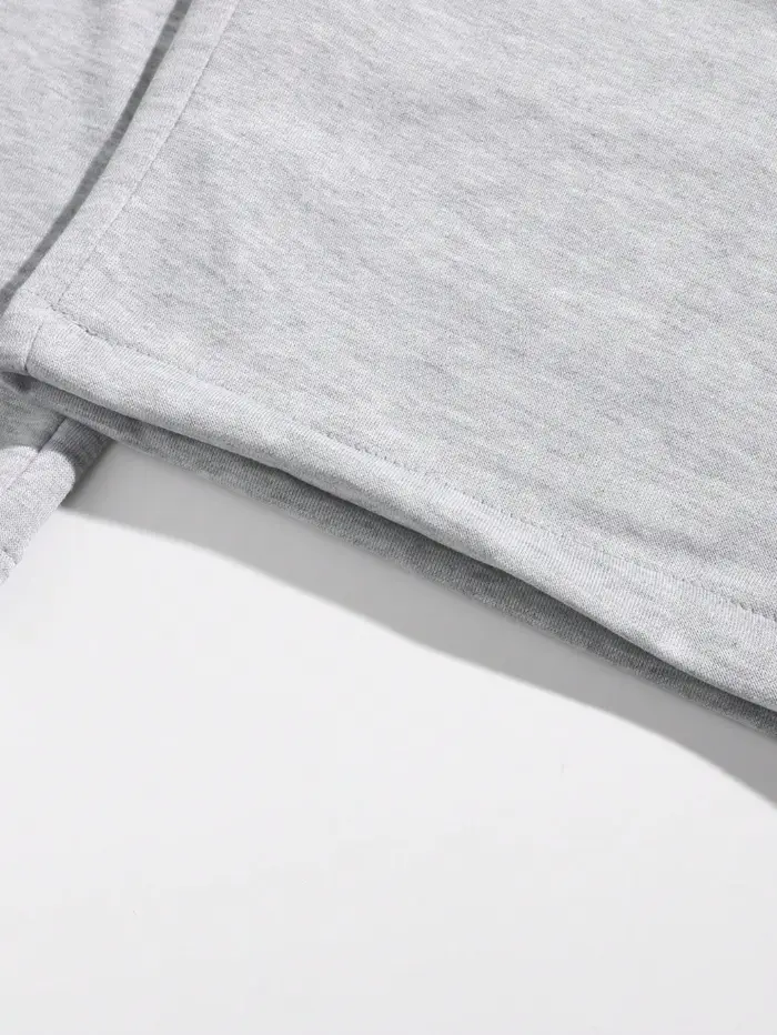 Shorts amples décontractés pour hommes, couleur unie, avec poches obliques, style estival élégant et