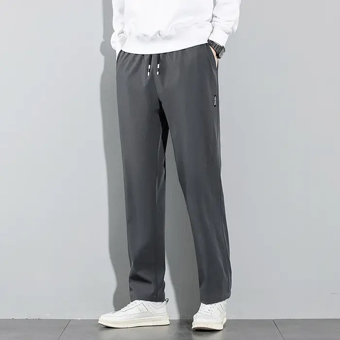 Pantalons pour hommes en soie glacée 2025 été nouveau noir gris mince pantalons décontractés d'affai