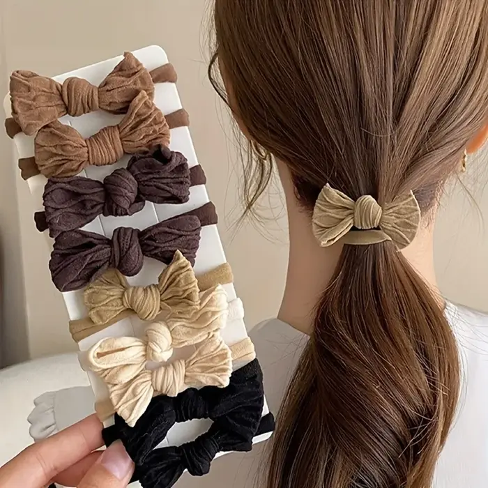 Porte-queue de cheval en tissu à haute élasticité avec nœud papillon de couleur unie – Accessoires p