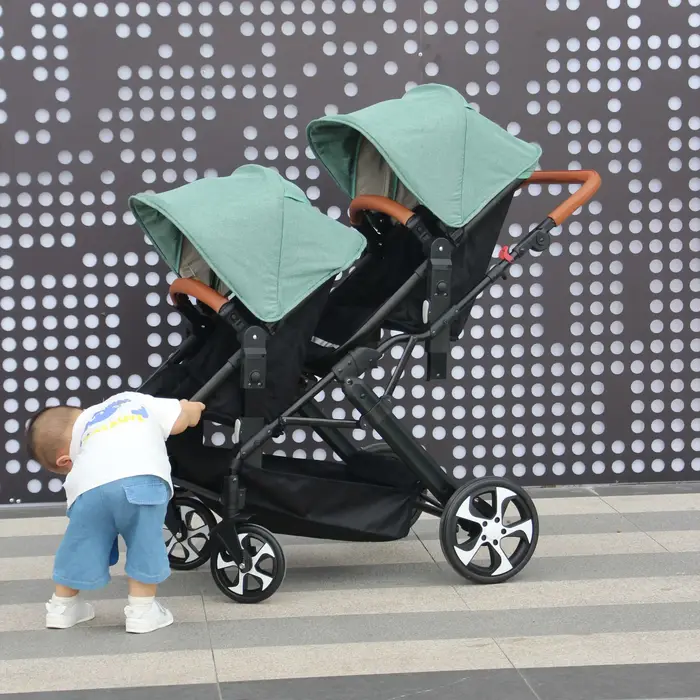 2025 Nouvelle poussette trois-en-un jumeaux avec siège auto, pliable, légère, équipée de cadeaux
